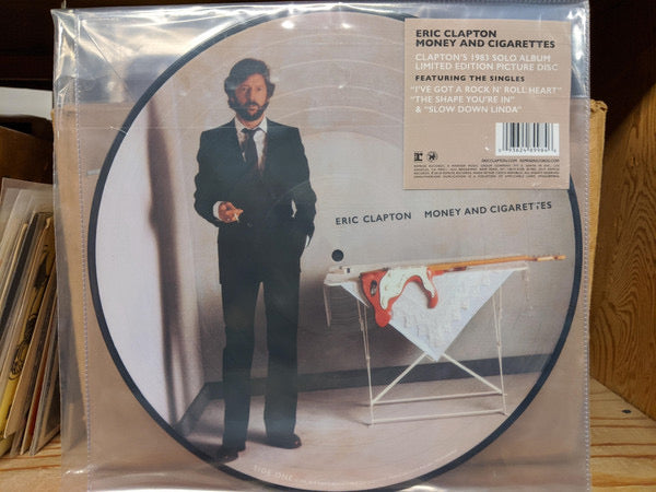 Eric Clapton- money and cigarettes